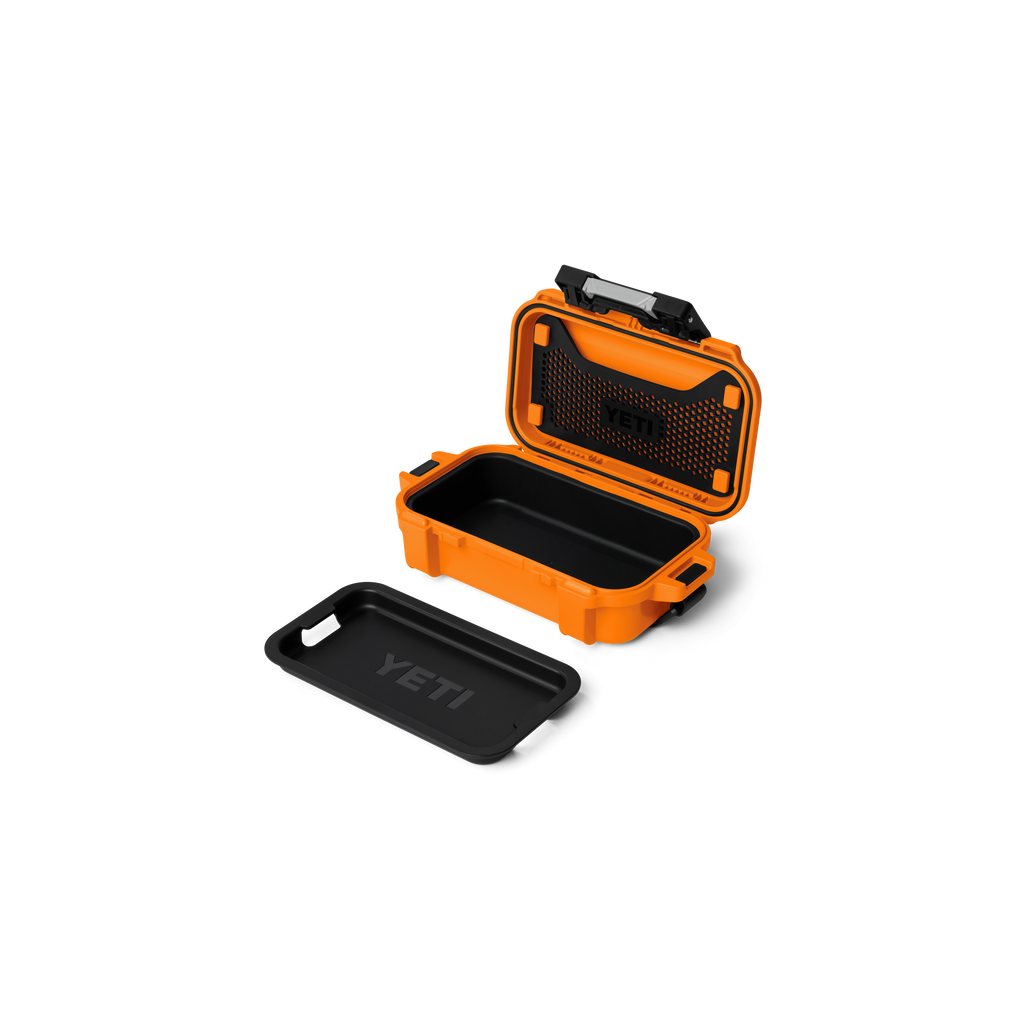 Orange gear case open with black insert tray and black lid pad