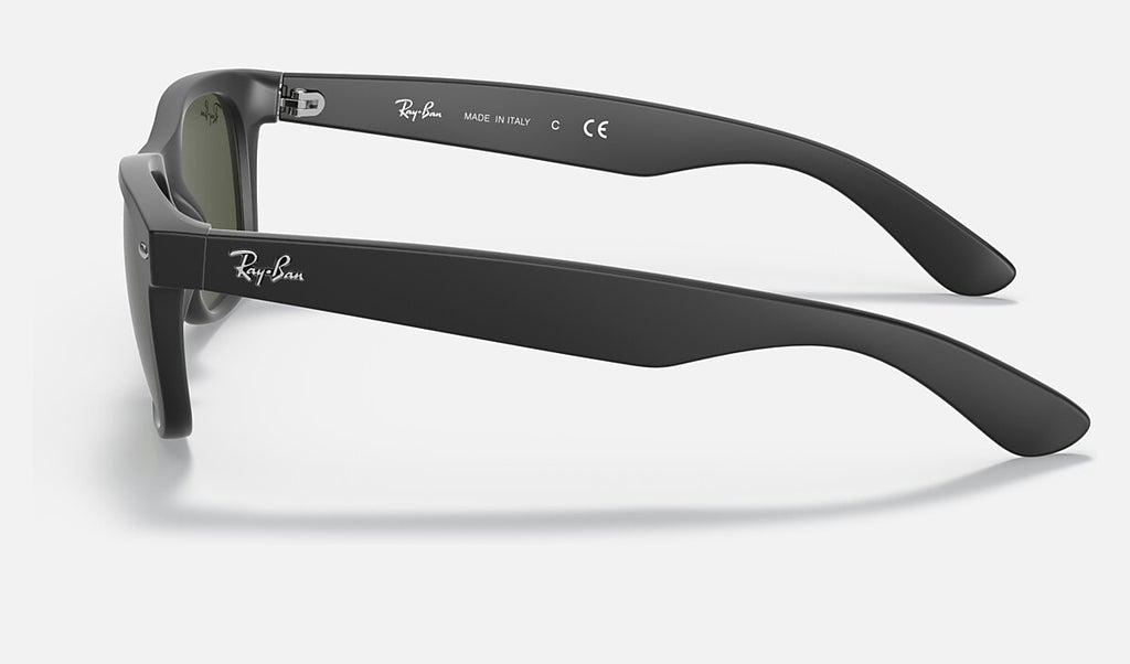 Ray-Ban wayfarer sunglasses side view, matte black frame with green lens.