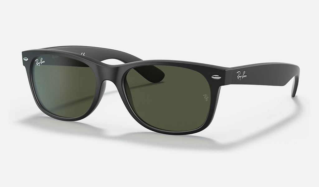 Ray-Ban wayfarer sunglasses, matte rubber black frame and green G-15 lenses.
