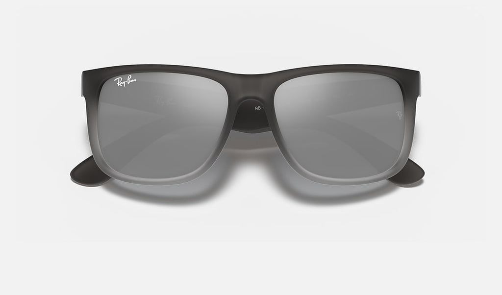 Ray-Ban Justin Classic sunglasses with smoke-gray lenses and translucent gray wide frame.