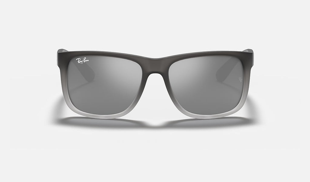 Ray-Ban Justin Classic sunglasses with translucent dark-gray frame and graduated dark lenses.