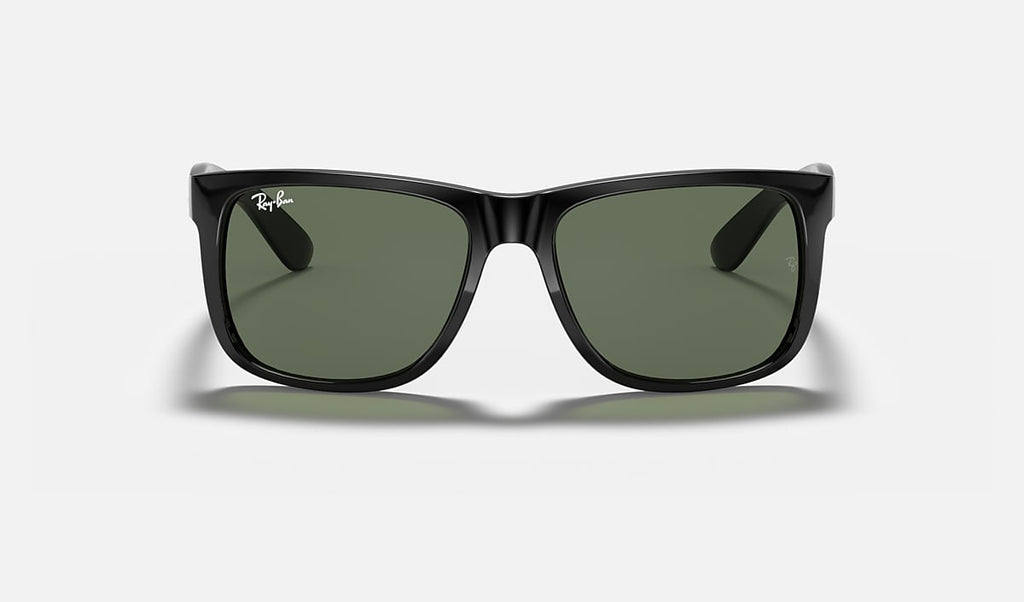 Ray-Ban black sunglasses with dark green lenses, front view.