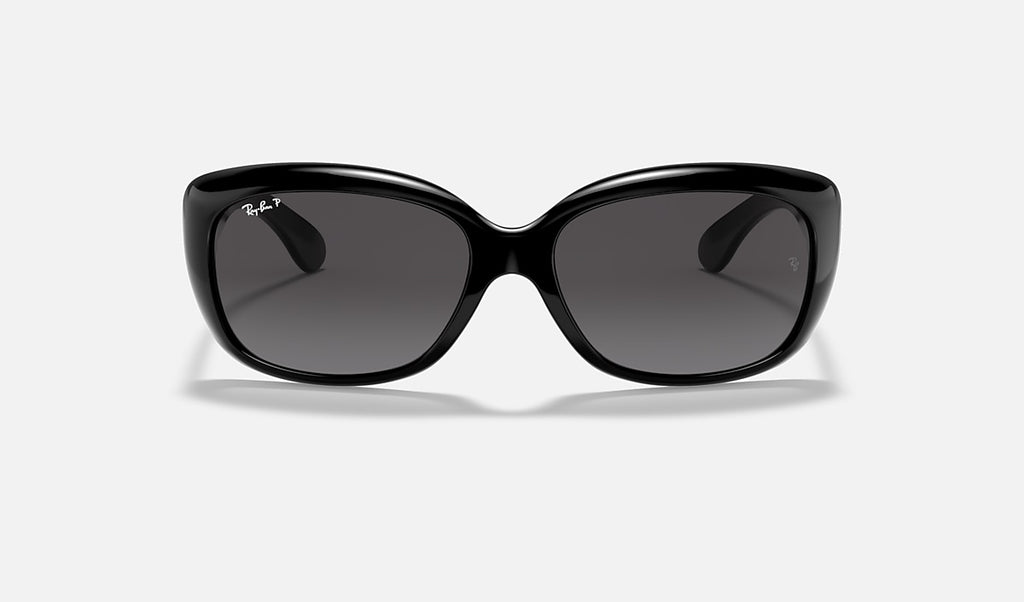 Polished black sunglasses with dark grey lenses, straight-on front view