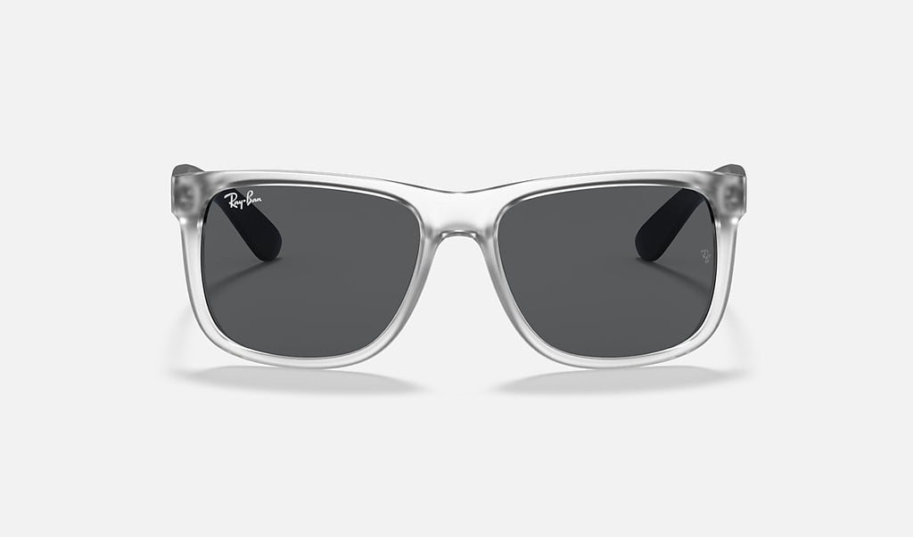 Square sunglasses with clear matte frame and dark grey lenses.