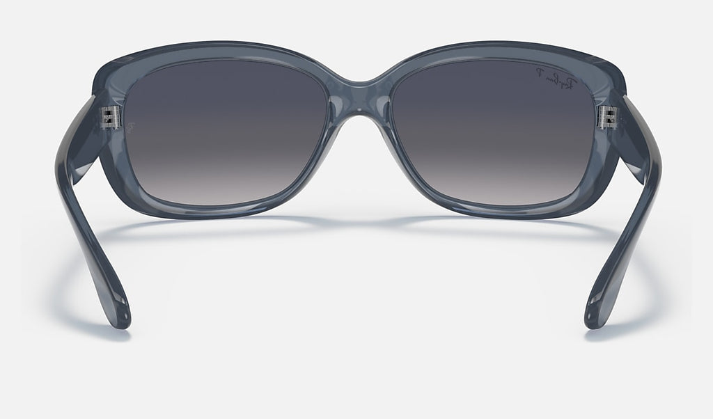 Polarised sunglasses front view, transparent blue thick oval frame with dark gradient lenses