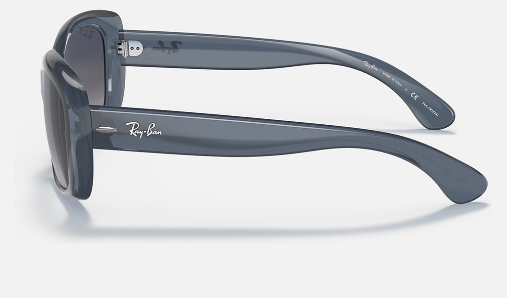 Polarised sunglasses side view, transparent blue acetate oval frame with curved temple tips