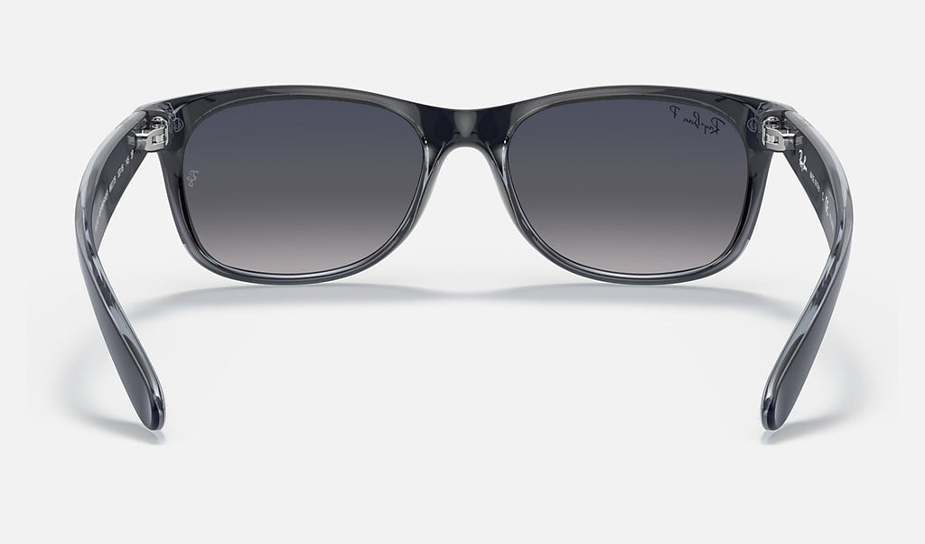 Matte blue wayfarer sunglasses with dark blue gradient polarized lenses, front view