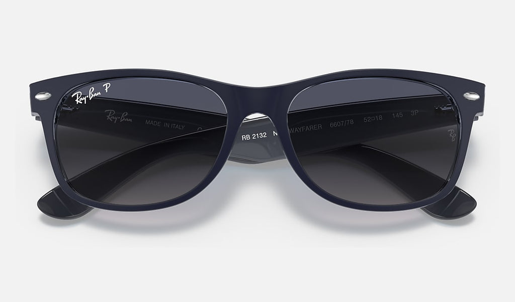 Matte blue wayfarer sunglasses with blue gradient polarized lenses, close front view