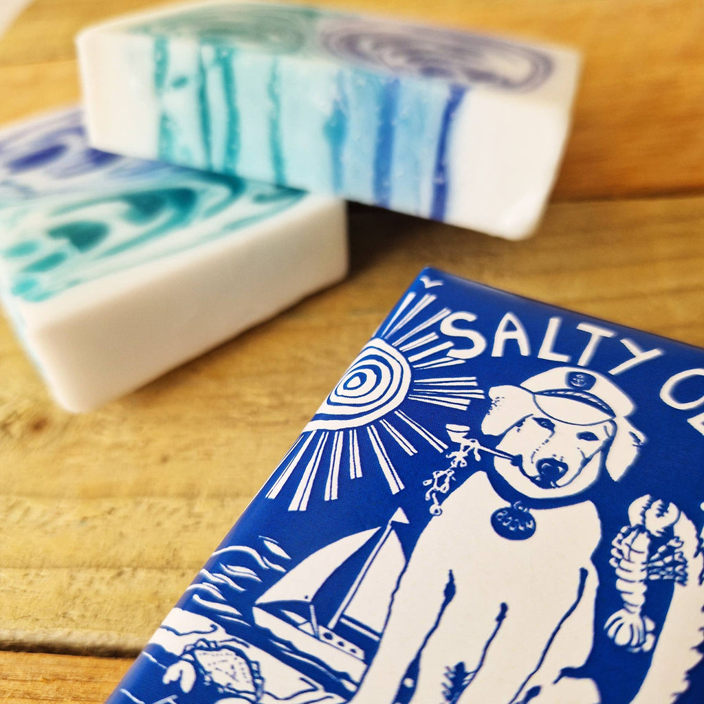 Hand crafted soap bar with blue-and-white Sea Dog label, close-up
