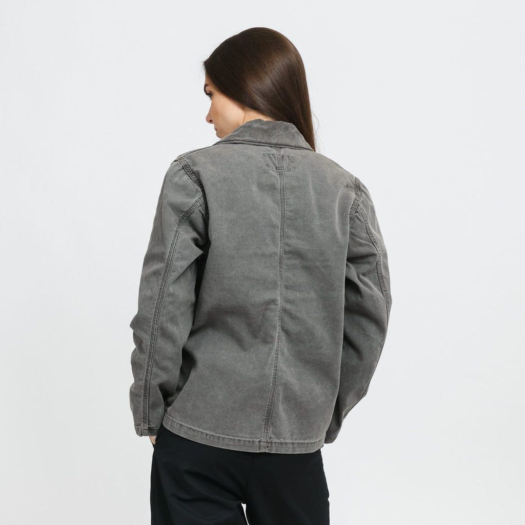 Women's faded denim jacket, gray back view with stand collar and seams.