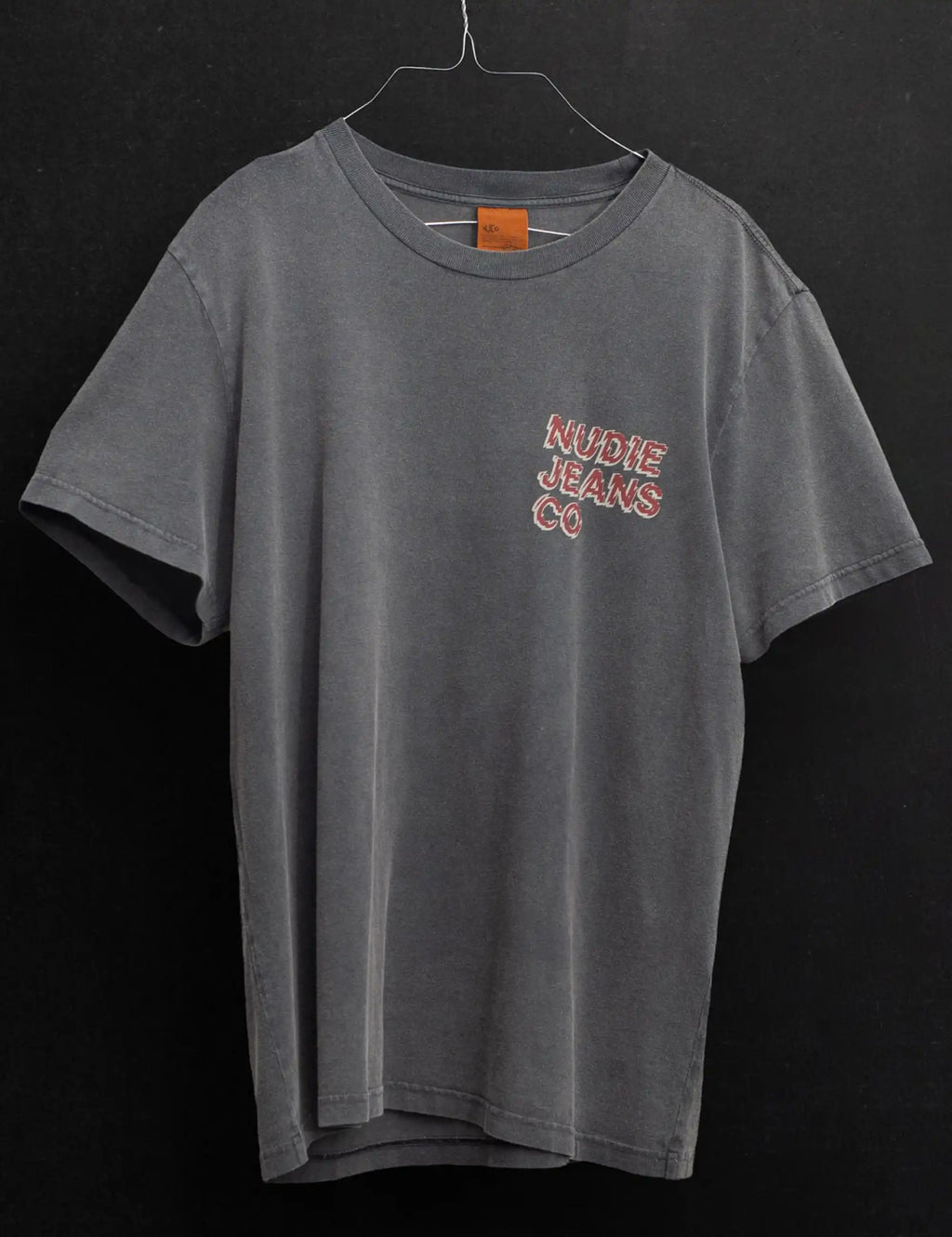 Anthracite T-shirt hanging with small Nudie Jeans Co chest logo