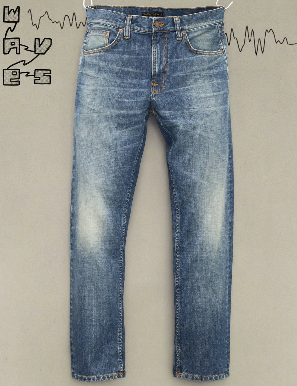 Light blue denim jeans with straight leg, belt loops, and five-pocket styling