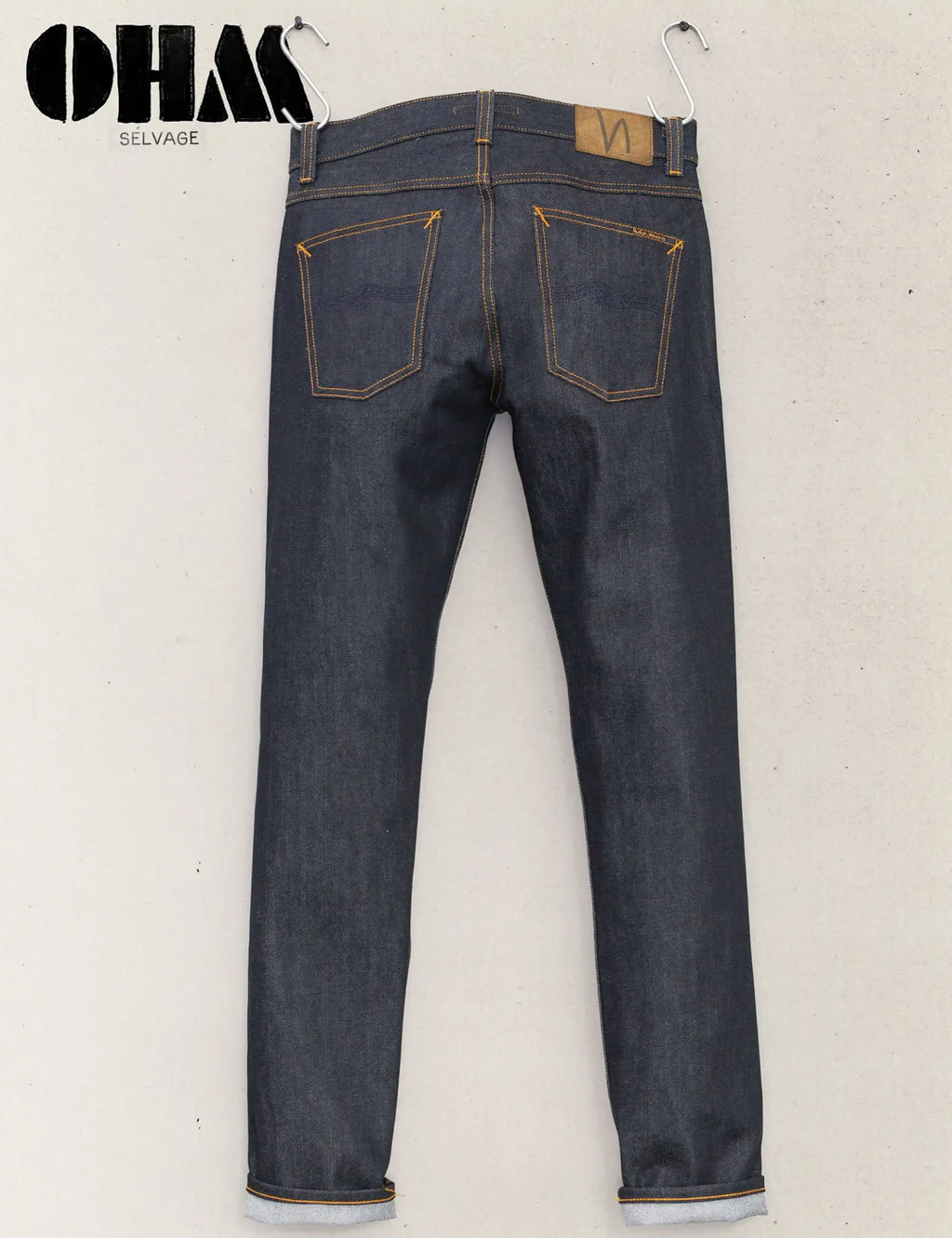Men's blue dry selvage jeans, straight fit, leather patch, copper-orange topstitch