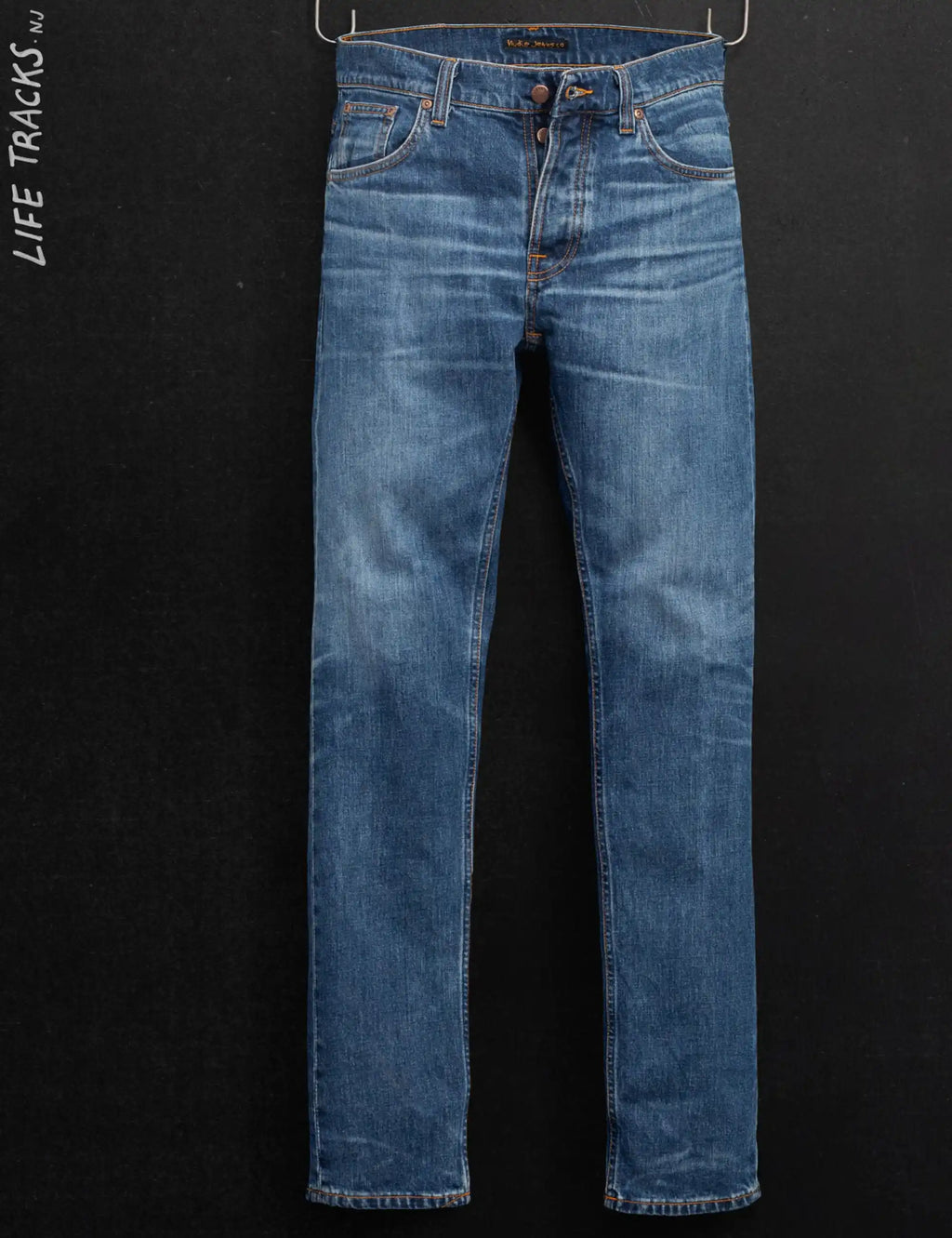 Blue denim jeans with orange contrast stitching, button waistband, and belt loops
