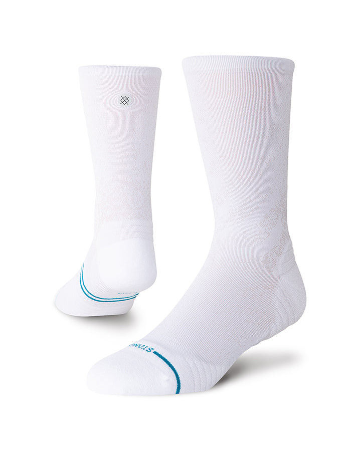 Stance white crew run socks with blue heel-toe stripe and small cuff logo