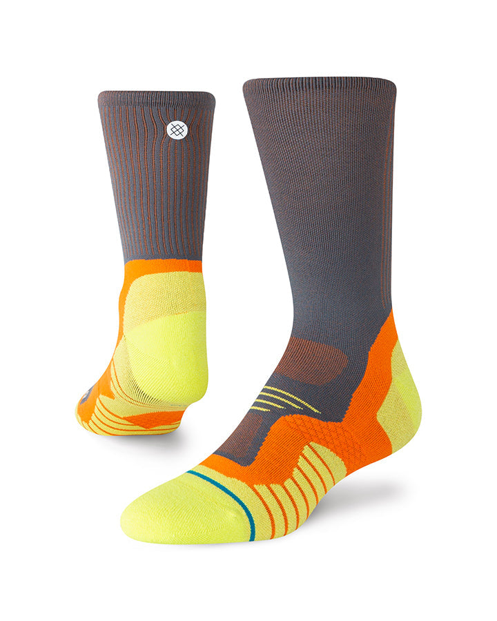 Light crew socks: dark blue/orange swirl stripes, neon yellow toe