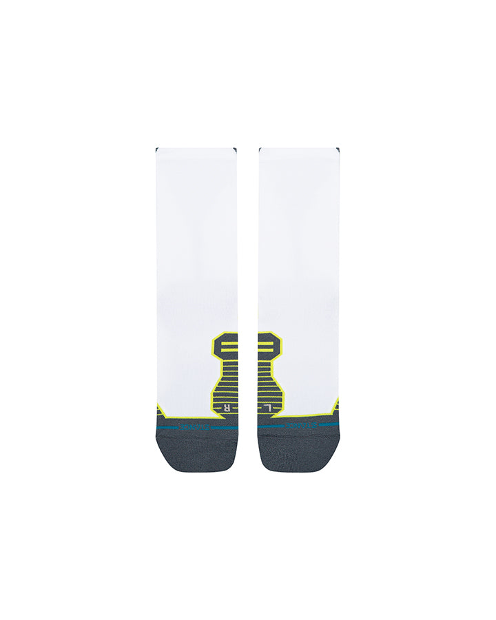 Pair of crew socks, white with dark cuffs and neon yellow-green calf graphic.