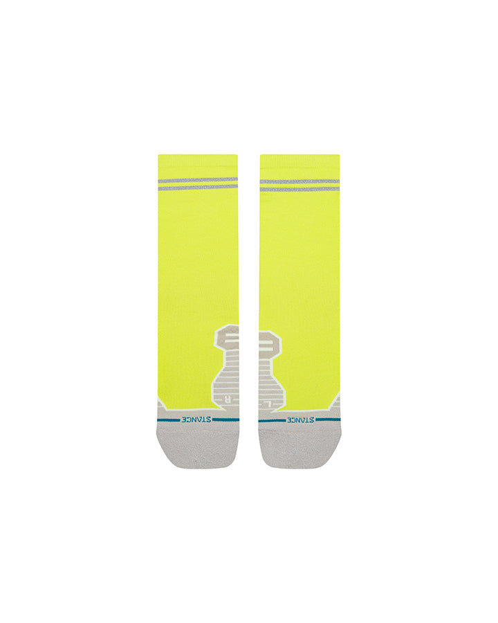 Neon yellow crew socks with gray soles and reflective bands