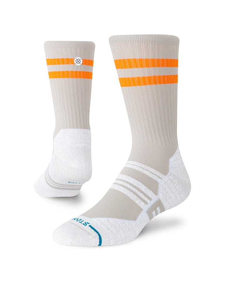 Light grey crew socks with orange stripes and patterned heel and toe