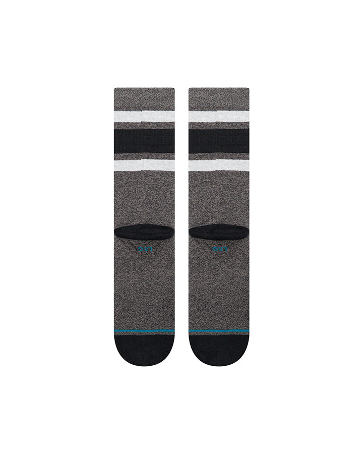 Charcoal crew socks with horizontal stripes and blue heel-toe accents, front view
