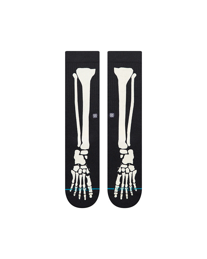 Black crew socks showing full white bone art front, with small blue details