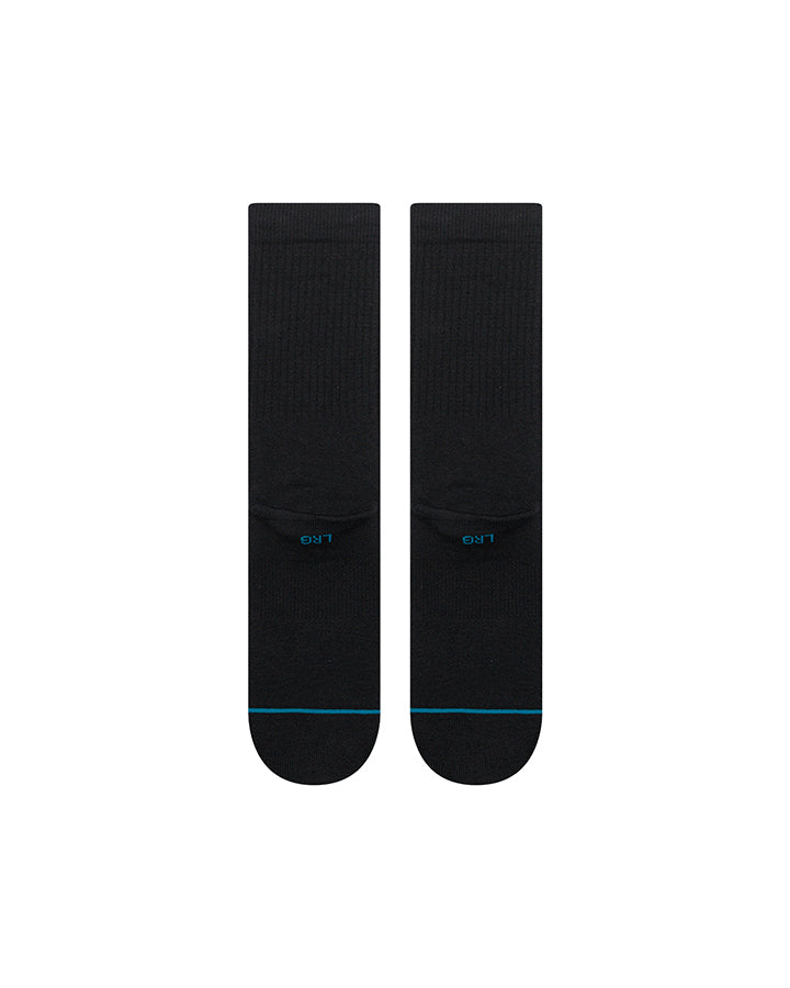 Black crew socks with subtle blue heel logo and solid ribbed fabric
