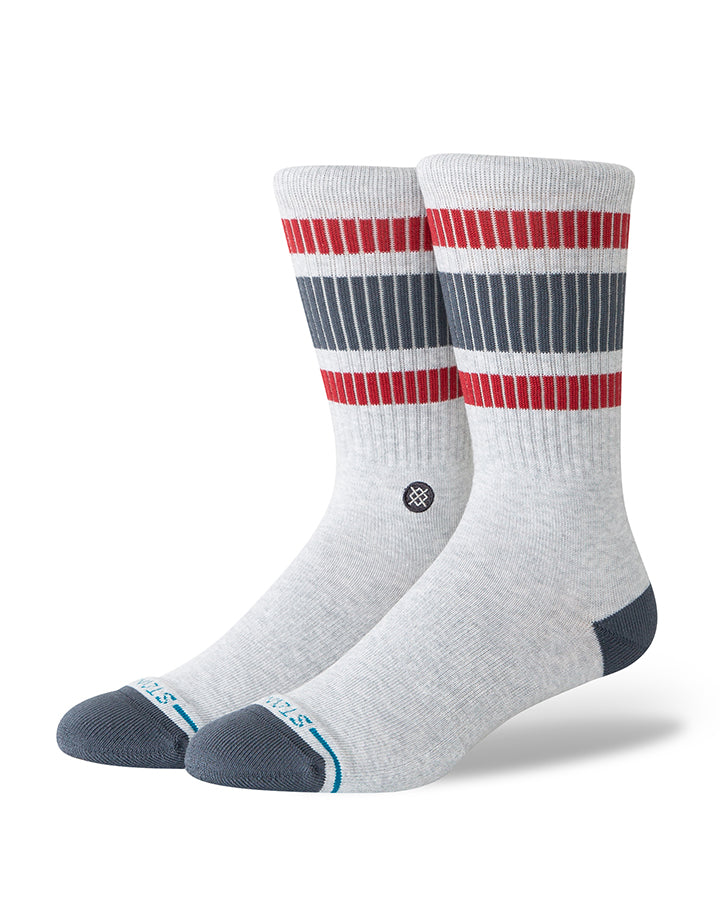 Stance crew socks in heather grey with red, black, and white stripe bands