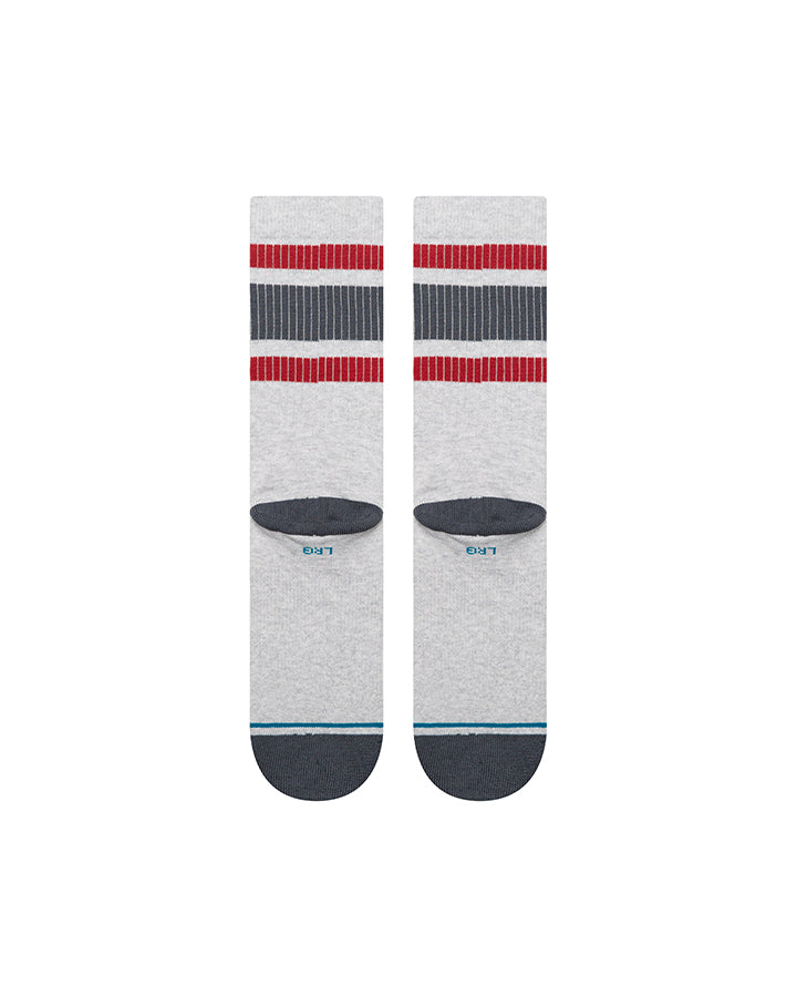 Stance crew socks in heather grey with red, black, and white stripes and blue toe logo