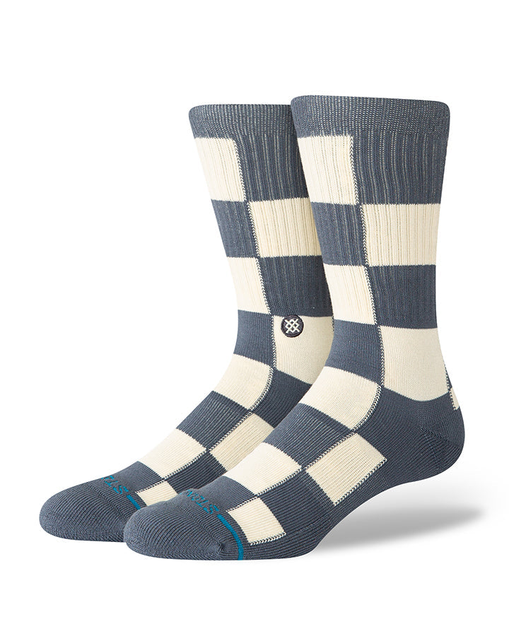 Navy and cream checkered crew socks with ribbed cuffs and blue toe/heel accents