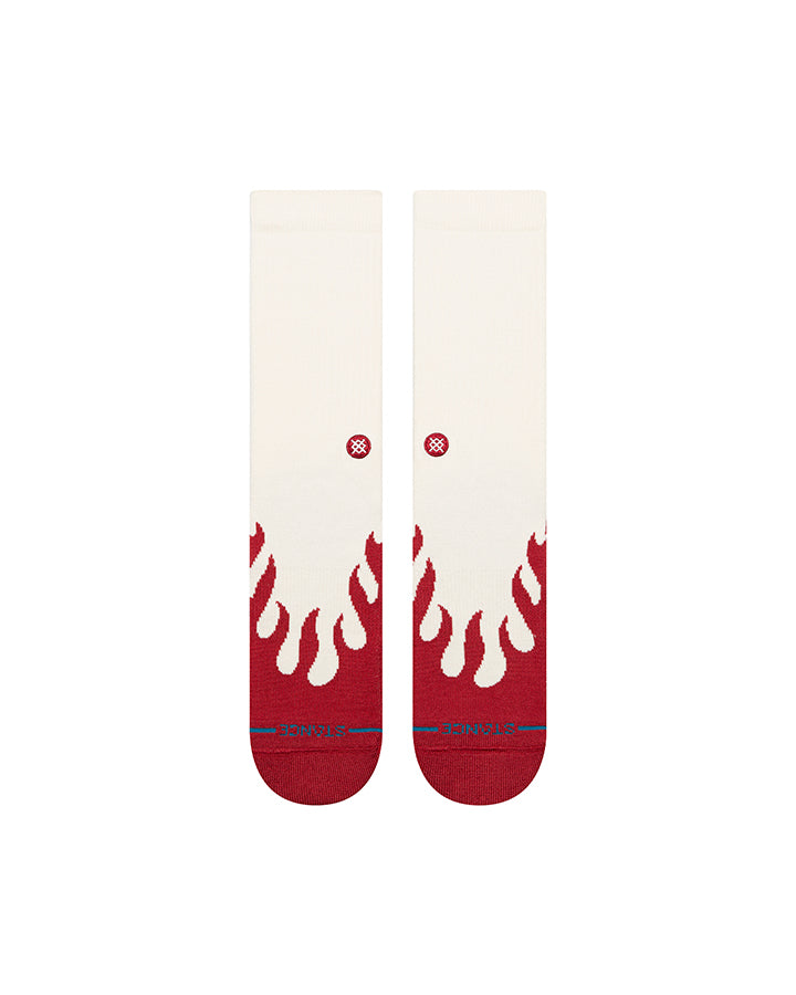 Crew socks, back view: white with red flame graphic at ankle and toe