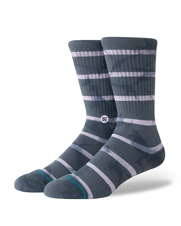 Crew socks in dark navy with wide striped pattern, ribbed cuffs, and turquoise heel accents.