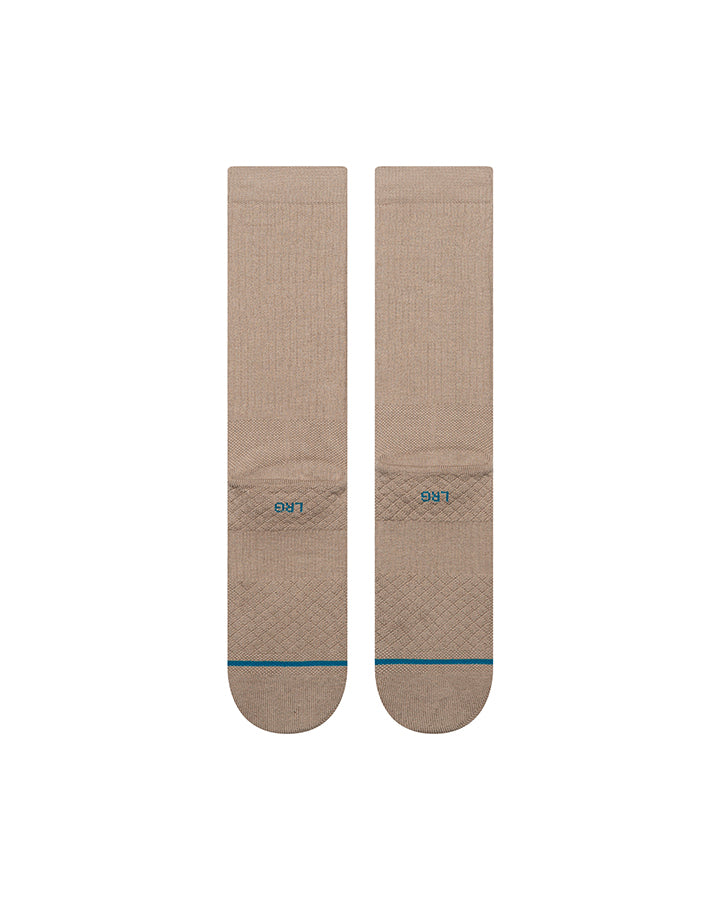 Pair of light gray crew socks with blue striped logo across toe and ribbed cuffs