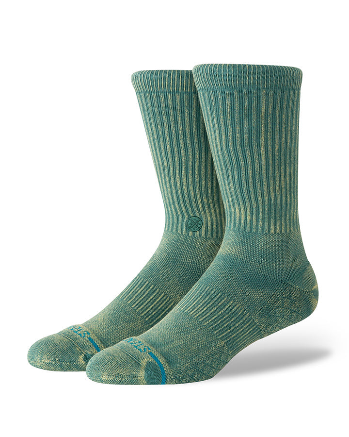 Teal ribbed crew socks with knit texture and small logo at toe