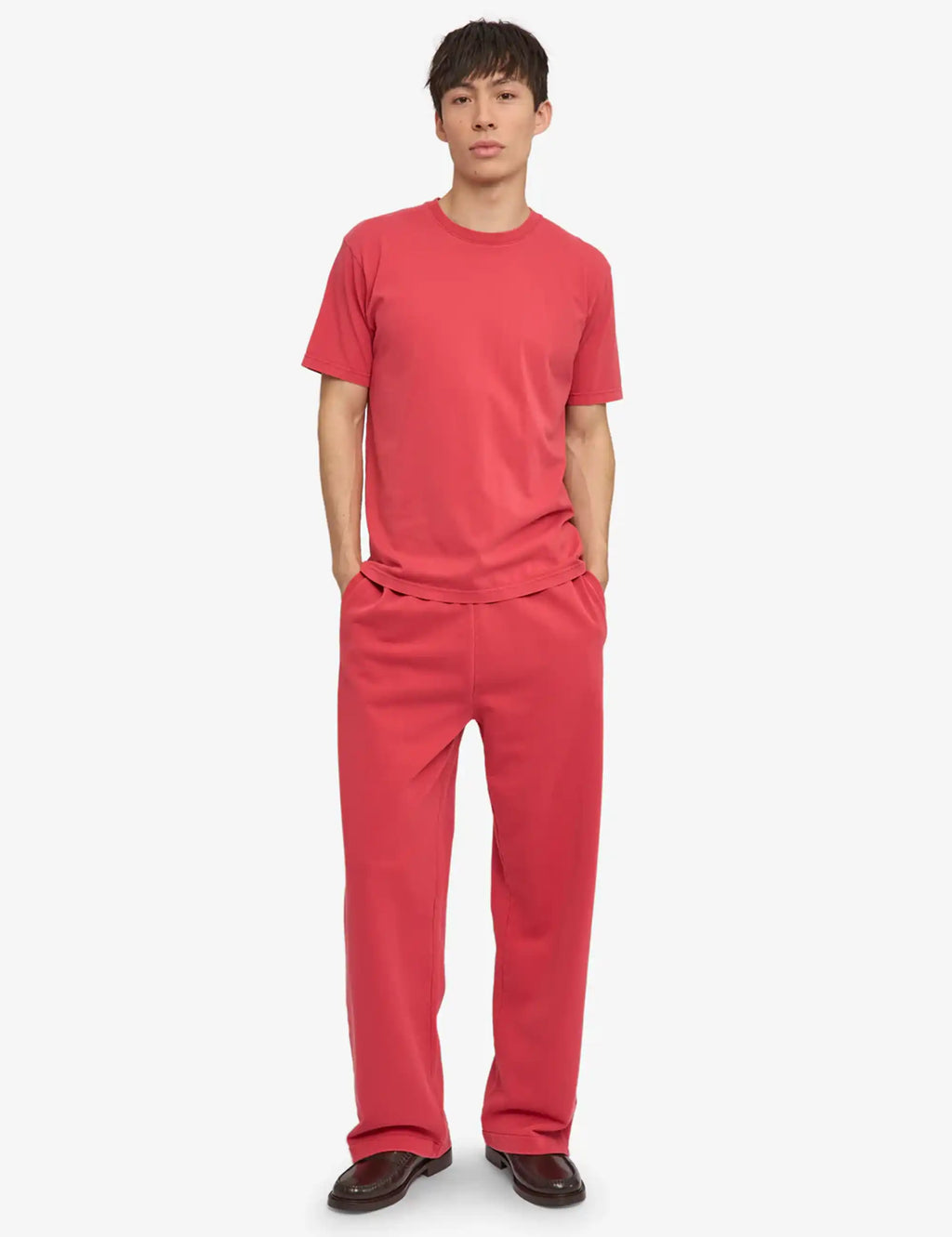 Faded red crew-neck short-sleeve t-shirt worn with matching pants