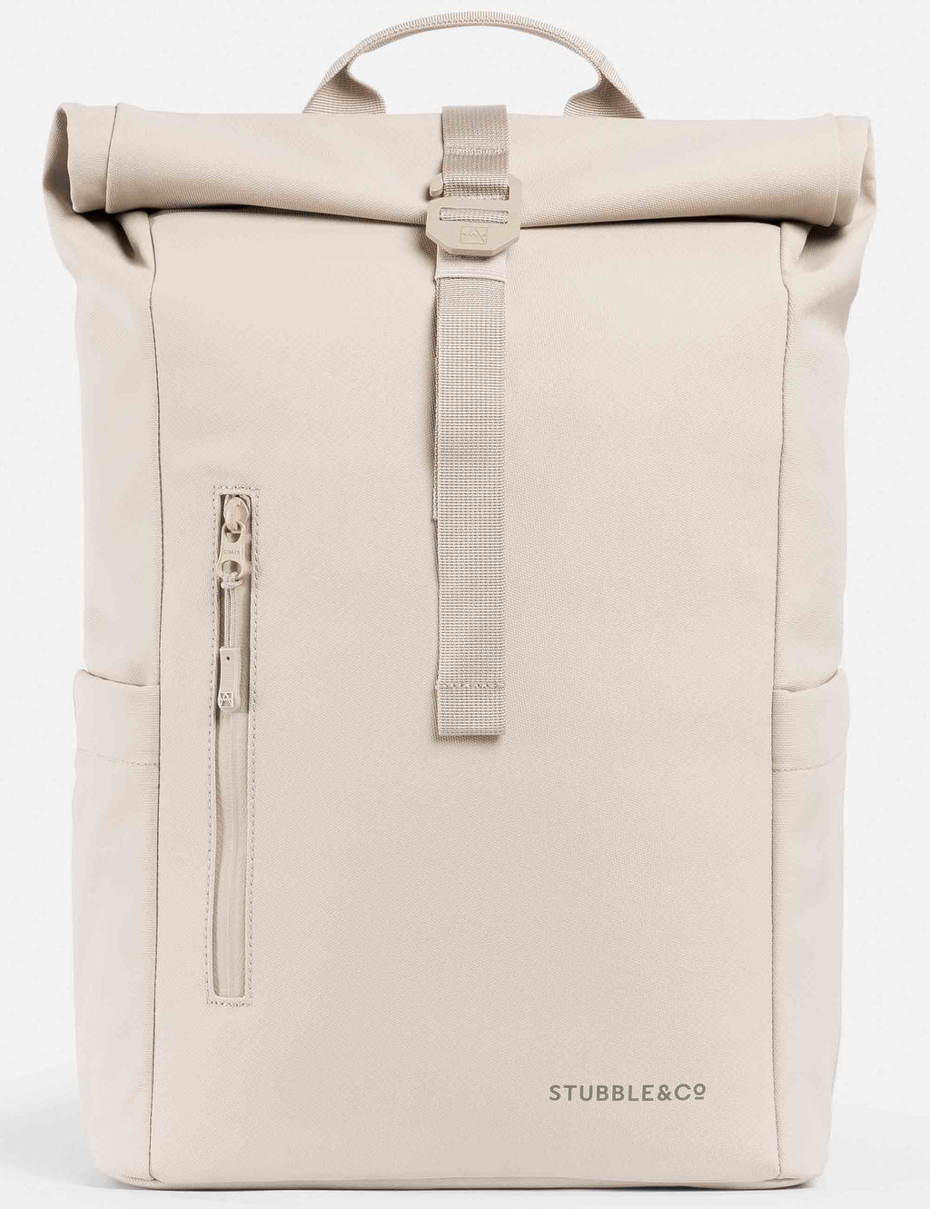 Roll-top backpack in tonal sand, top roll closure with carry handle and front strap.