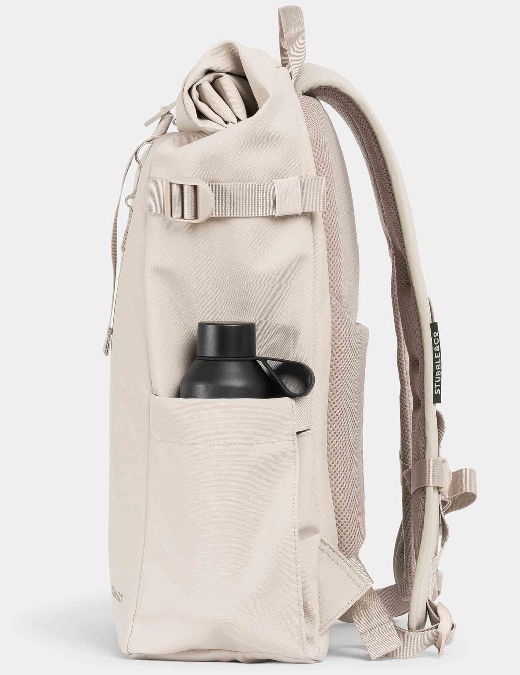Sand roll-top backpack open view, showing top roll and internal compartment