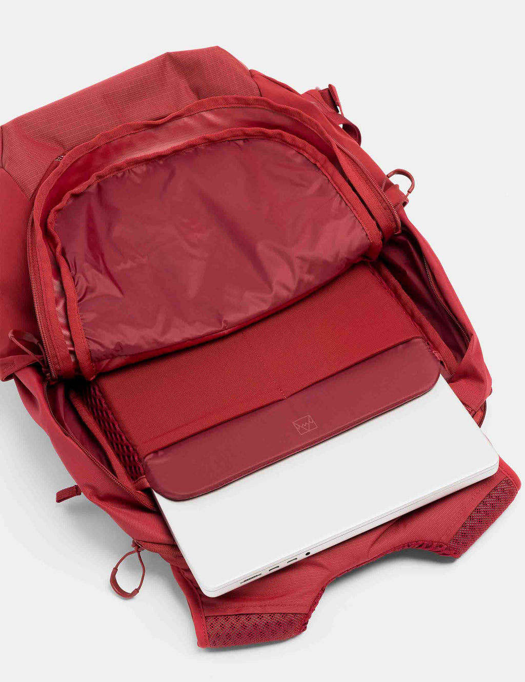 20L motion backpack in Magma red, front pocket and zippered main compartment