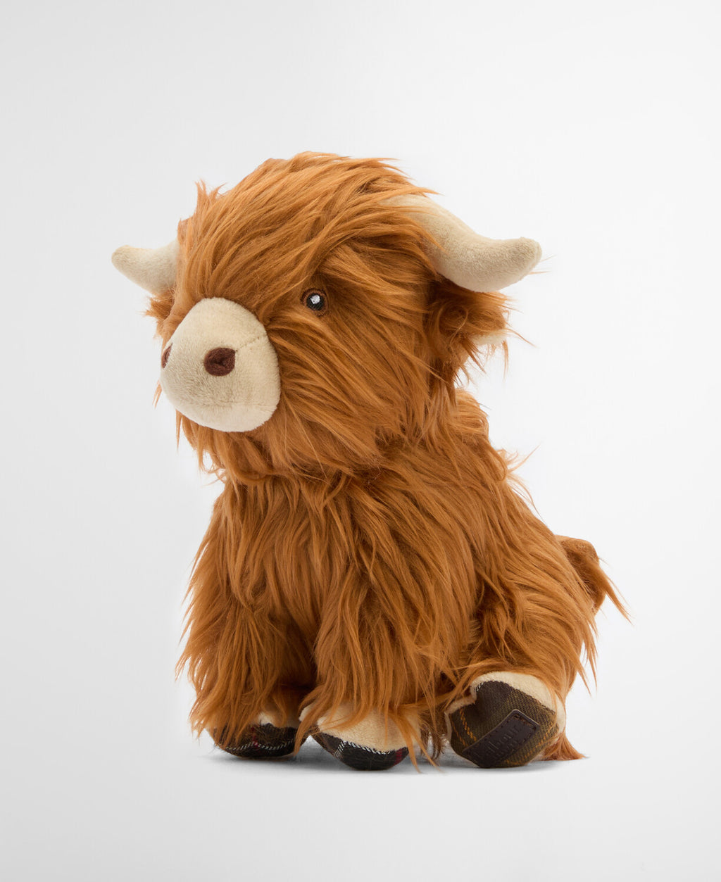Brown plush Highland cow dog toy in profile with beige snout and textured fur