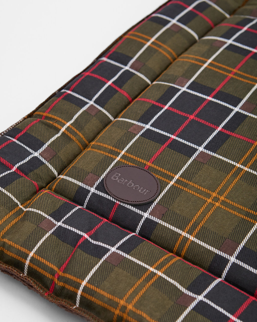 Barbour tartan dog mat detail: brown plaid with white, red, navy grid