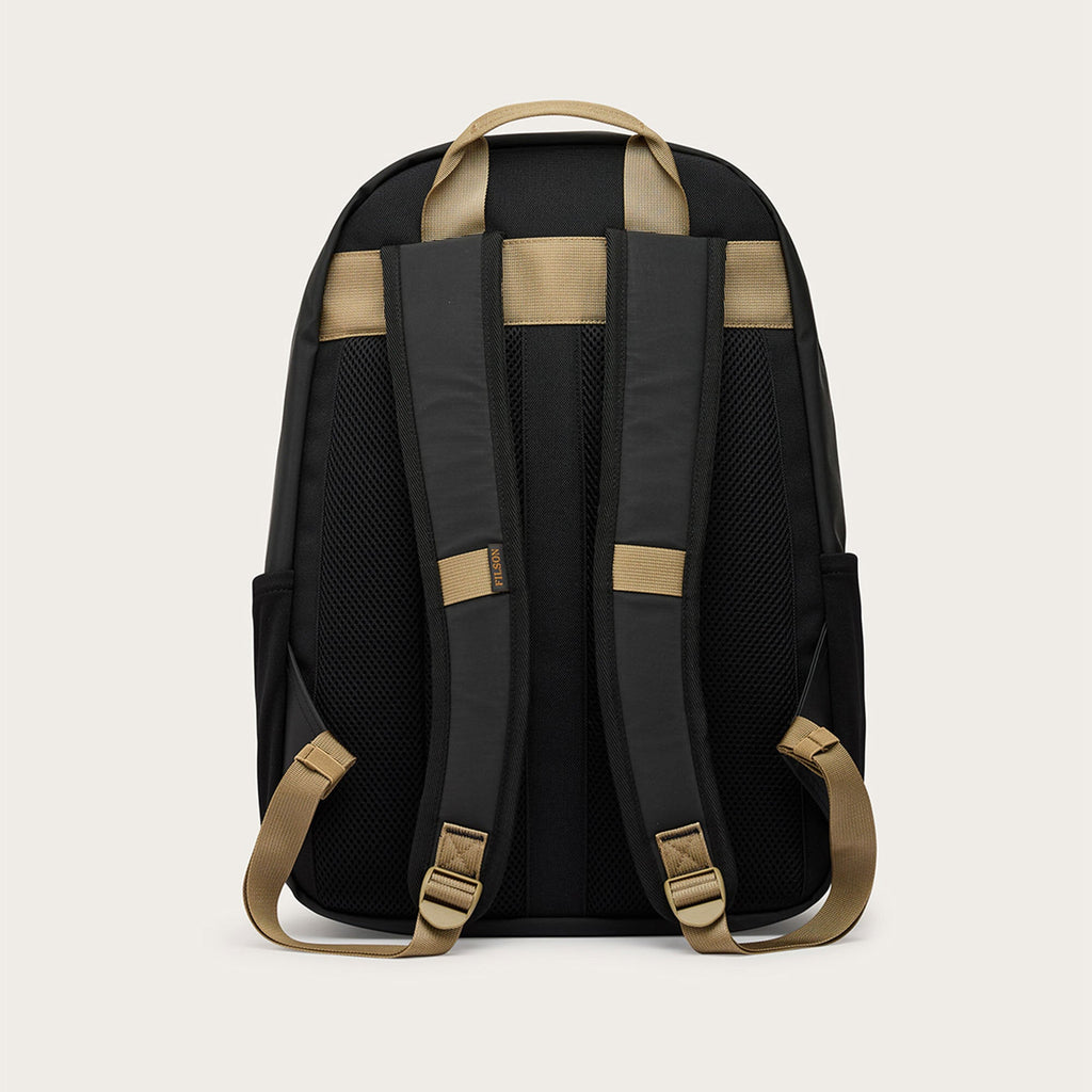 Scout Journey backpack, black back panel with mesh and adjustable tan shoulder straps.