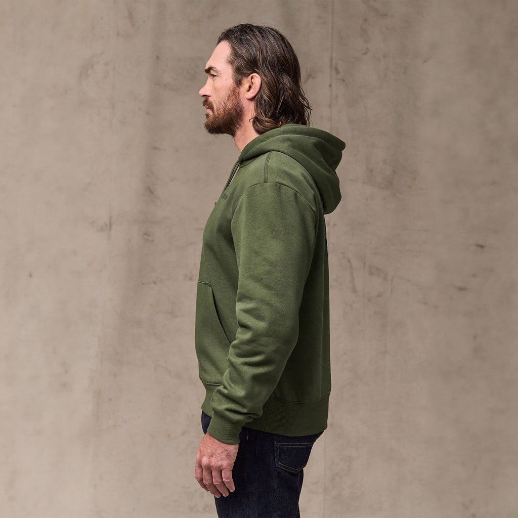 Filson Scenic Graphic Hoodie in Surplus Green, worn rear