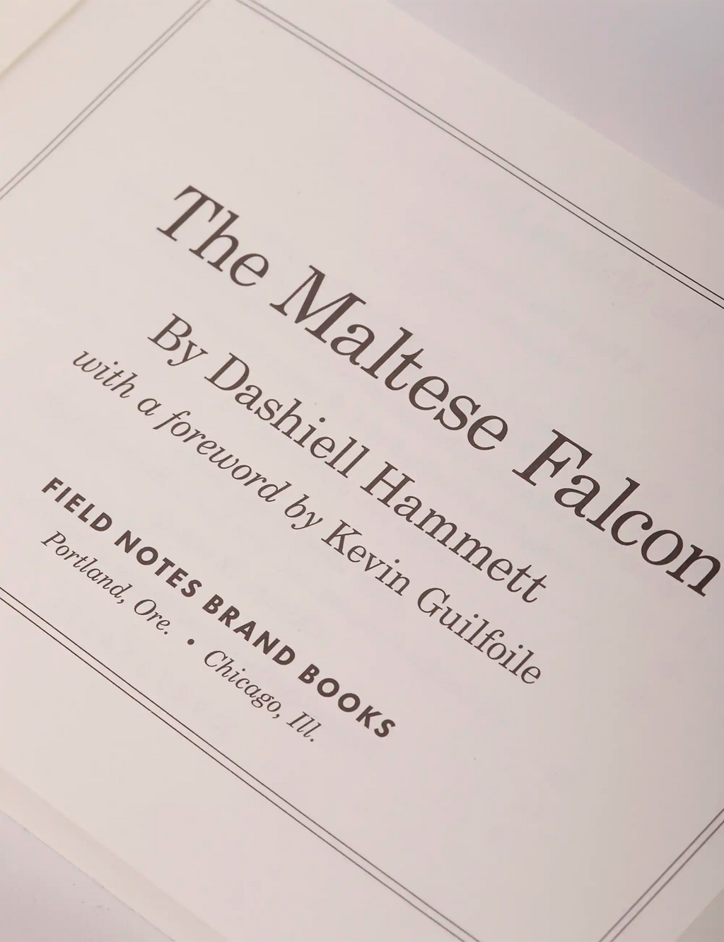 Book title page with “The Maltese Falcon” lettering and author/editor lines.