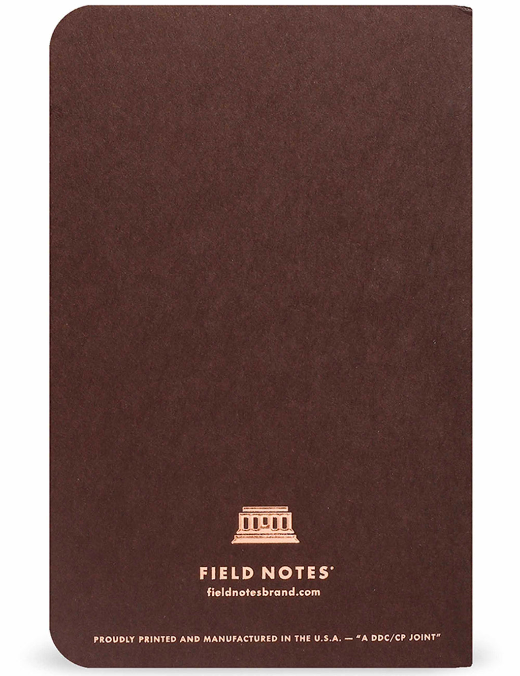 Dark brown quarterly memo book back cover with Field Notes logo and badge emblem