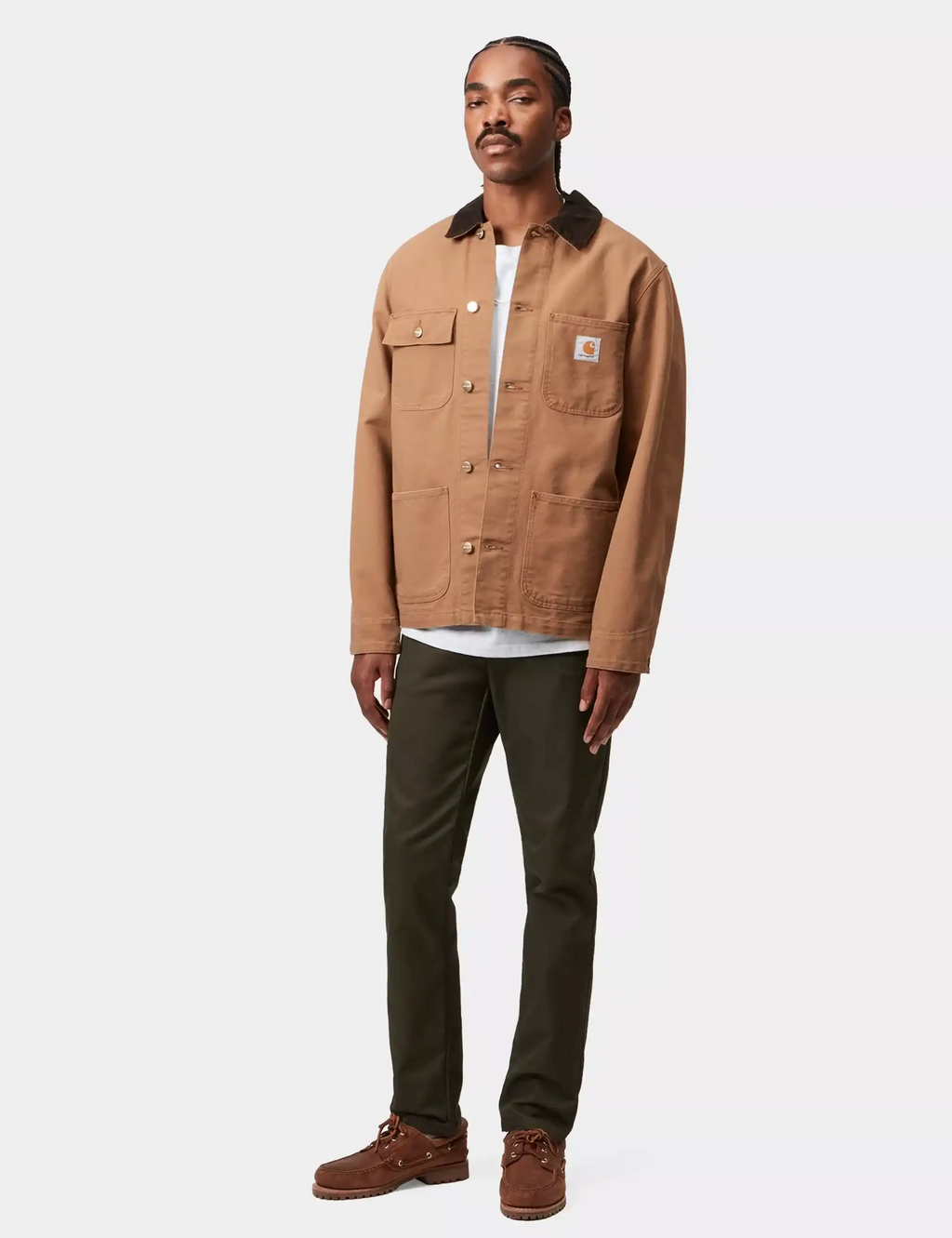 Men’s dark cypress pants worn with a work shirt; straight silhouette and cuffed hem