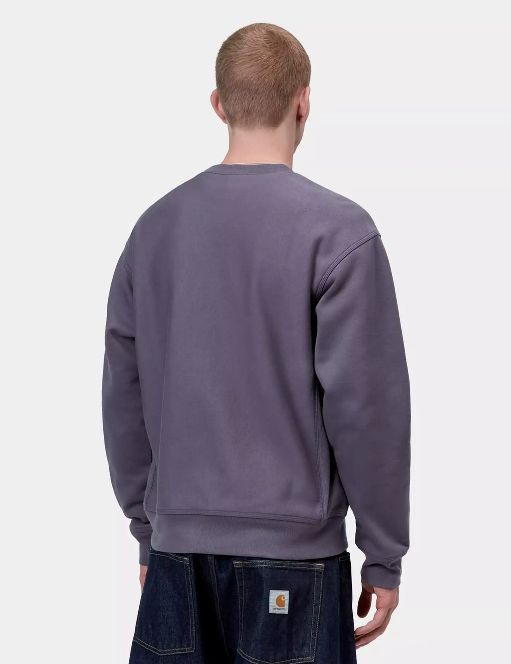 Back view of purple crewneck sweatshirt with ribbed hem and cuffs
