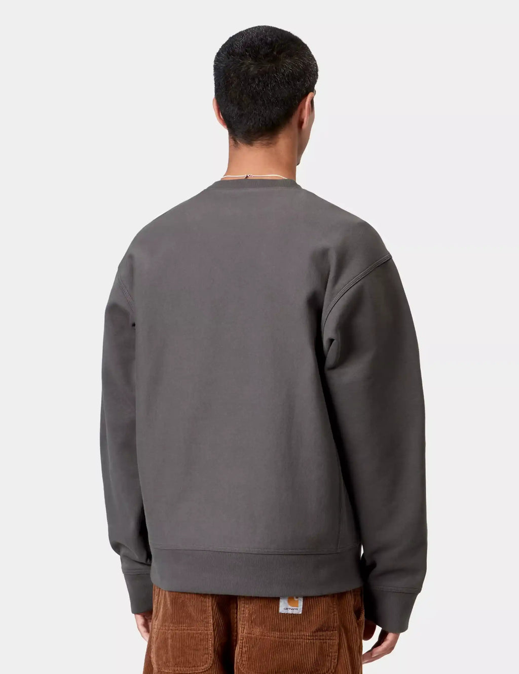 Carhartt WIP graphite crewneck sweatshirt back on model, long sleeves, ribbed hem