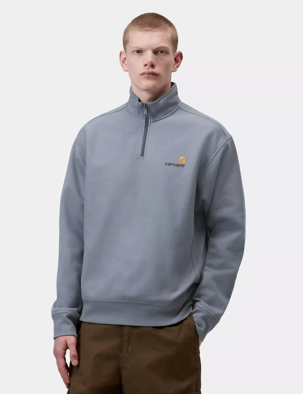 Shady blue half-zip sweatshirt with chest logo, stand collar, ribbed cuffs and hem.