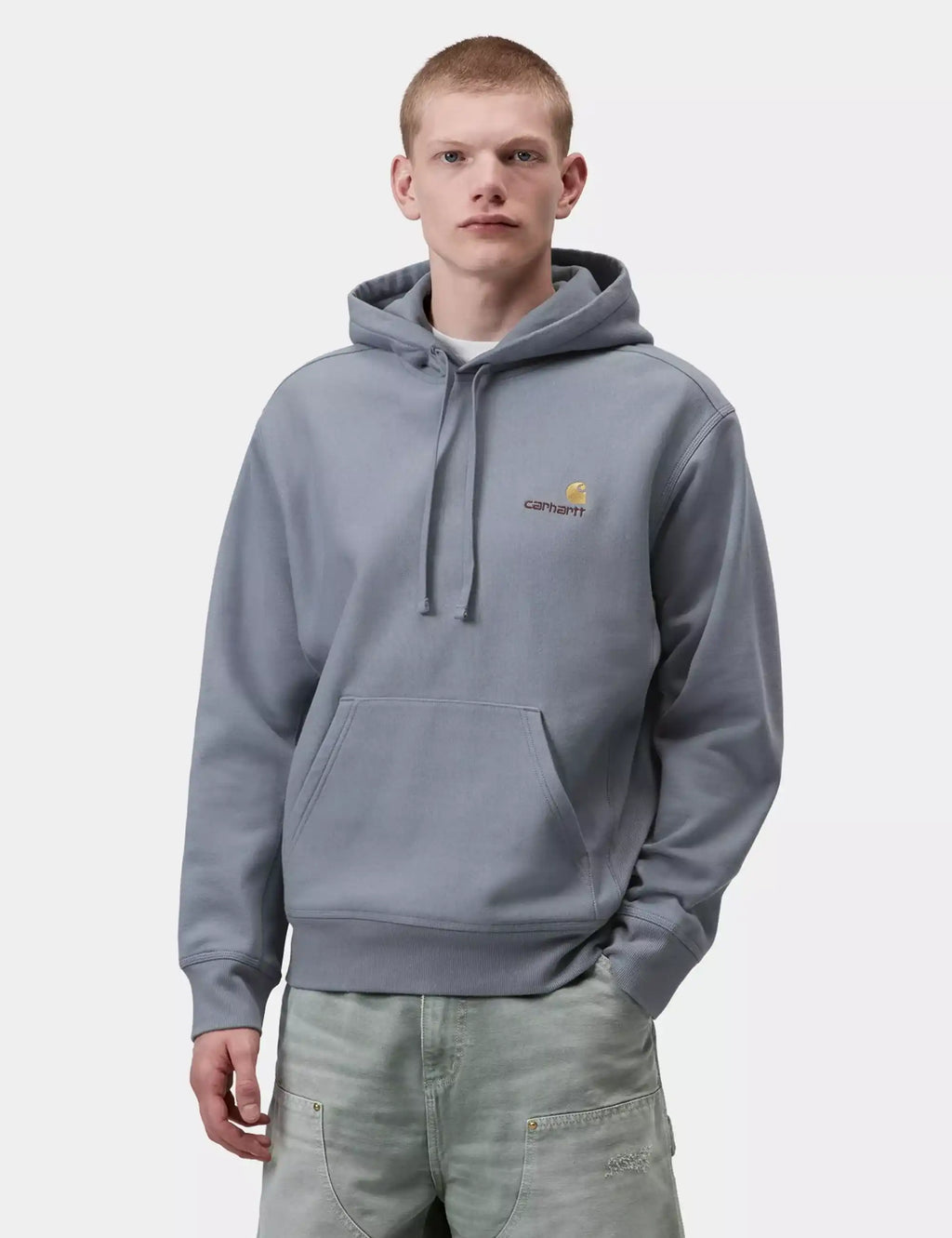 Shady blue hooded sweatshirt on model with kangaroo pocket and chest logo