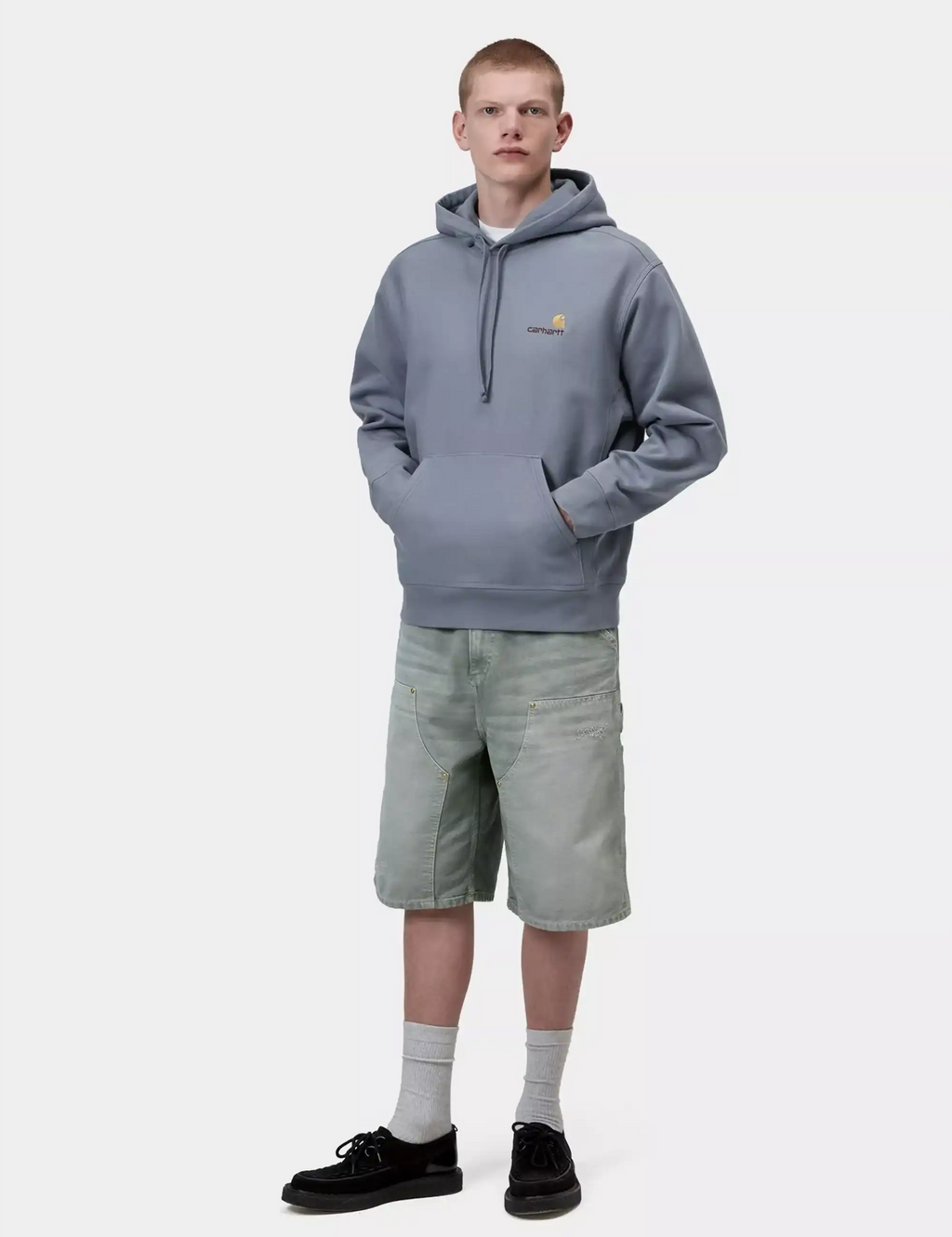 Shady blue hooded sweatshirt with drawstring hood and chest logo worn on model