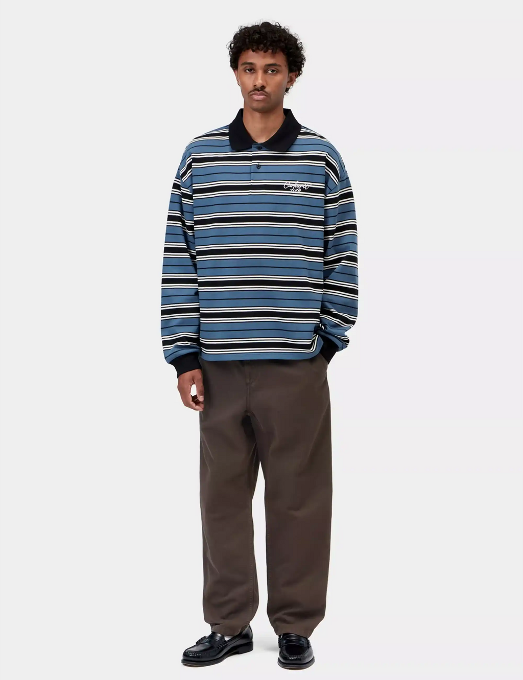 Tobacco-brown pants with relaxed fit, elastic waistband, and side pockets